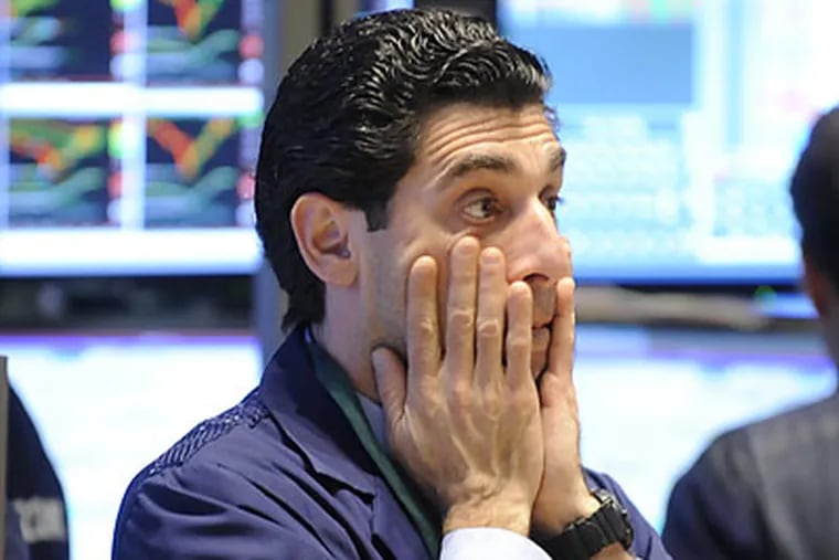 The stock market's wild fluctuations in recent weeks have come at the time as increased consumer fear about the direction of the economy. (Richard Drew/AP)