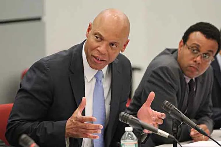 Here, Superintendent William Hite (left)  is seen in a file photo presiding over a School Reform Commission meeting. At Thursday's SRC meeting, three Philadelphia principals were fired in a cheating probe. (CHARLES FOX / Staff Photographer / File)