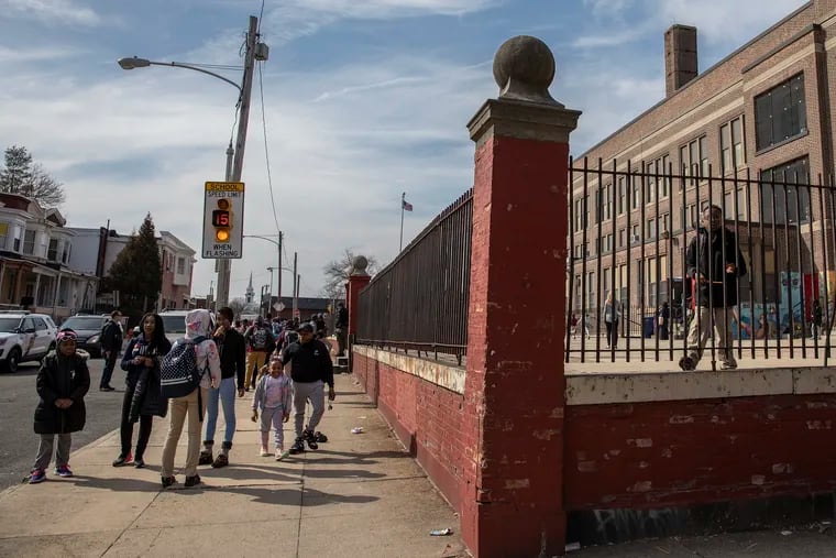 Dismissal at Jay Cooke elementary school in North Philadelphia on Thursday, March 14, 2019. An April 2019 Inquirer investigation identified Cooke as one of many Philly schools with high teacher turnover.