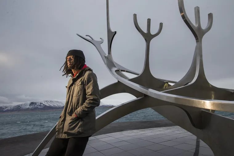 Tyrone Garland stands by the statue, Sun Voyager (Solfar) on the Saebraut St. waterfront in Reykjavik on Feb. 6, 2017. Tyrone, who starred at La Salle University, is playing for Breidablik in Kopavogur, Iceland. CHARLES FOX / Staff Photographer