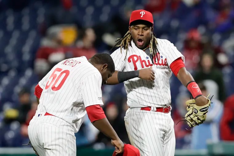 Recently demoted Phillies third baseman Maikel Franco, right, has a supporter in close friend Hector Neris.