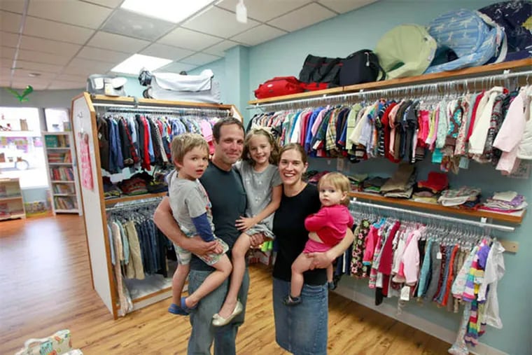 Christopher and Jennifer Kinka, owners of the Nesting House in Mount Airy, opened a Collingswood branch July 26. Customers turn in children's clothing for cash or store credit on gently used children's clothing or other items. (David Swanson / Staff Photographer)