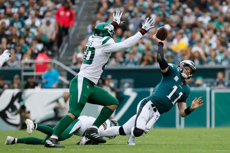 Carson Wentz narrowly escapes another injury; he should have taken this sack by Darryl Roberts instead of throwing this ball away. He limped away but remained in the game.