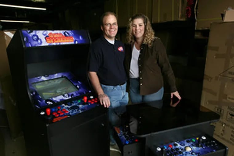 &quot;The games play exactly like the original,&quot; says Michael Ware, with wife, Michelle, in Dream Arcades&#0039; warehouse in Folsom, Calif. The Wares&#0039; products target a niche market of adults in their 30s and 40s.