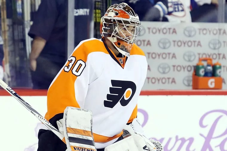 Philadelphia Flyers goalie Michal Neuvirth (30) prior to the game against the Winnipeg Jets at MTS Centre.