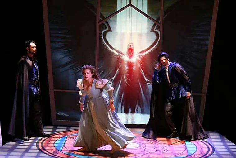 (From left) Diego Silva, Melinda Whittington and Andr&#0233; Courville in the AVA's &quot;Faust.&quot; (DON VALENTINO / AVA)