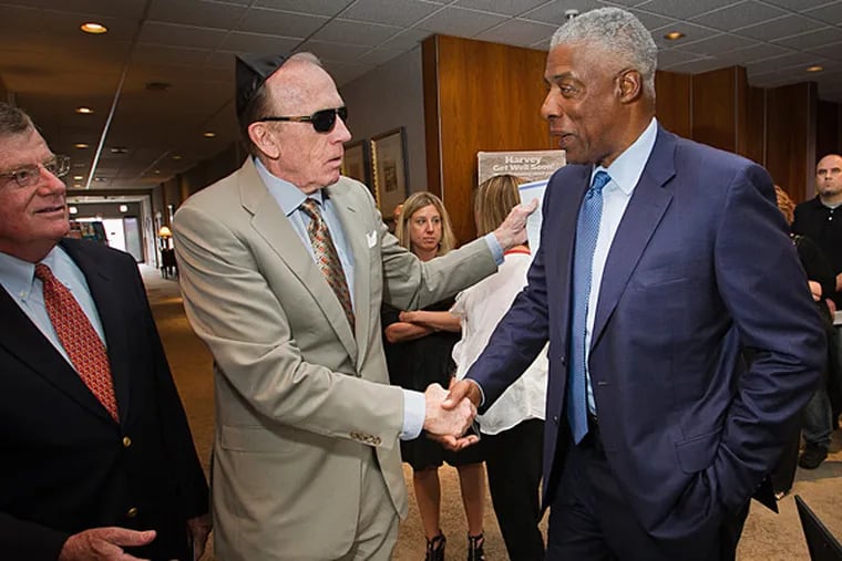 From left is Billy Cunningham and Julius Erving greeting in line at
funeral for Harvey Pollack. Funeral for Harvey Pollack of the
Philadelphia Sixers. Funeral held at Goldstein's Rosenberg's Raphael
Sacks, Inc at 6410 N. Broad St. in Philadelphia on Friday, June 26,
2015. (Alejandro A. Alzarez/Staff Photographer)