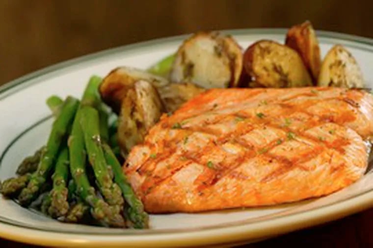 The King Salmon (above) at McCormick & Schmick&#0039;s, on S. Broad St., is typical of the restaurant&#0039;s fare: It&#0039;s moist, flavorful and not smothered in overpowering goo.