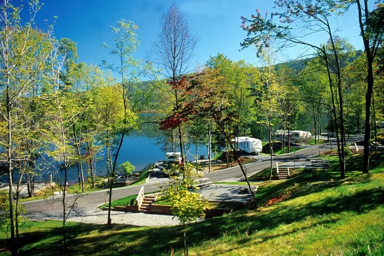 Camps in woods surrounding Raystown Lake, Pa., where 118 miles of shoreline is surrounded by towering green mountains and red cliffs. May 2006.