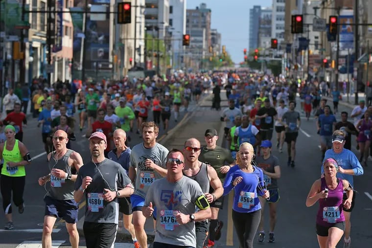 Runners reach Broad and Arch streets during the Broad Street Run on May 4, 2014.
