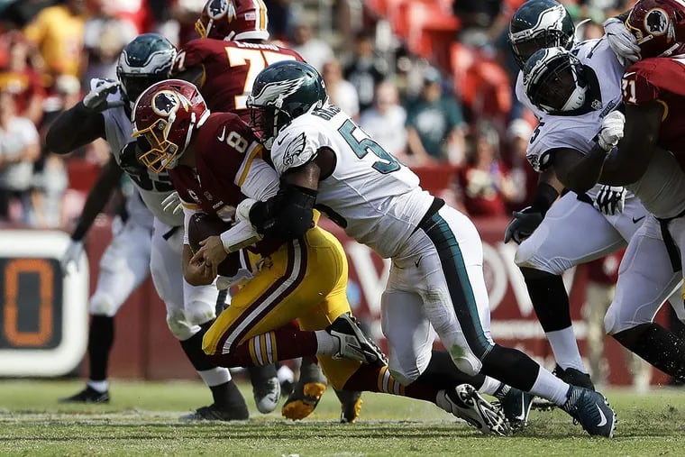 Eagles defensive end Brandon Graham sacks Washington Redskins quarterback Kirk Cousins.