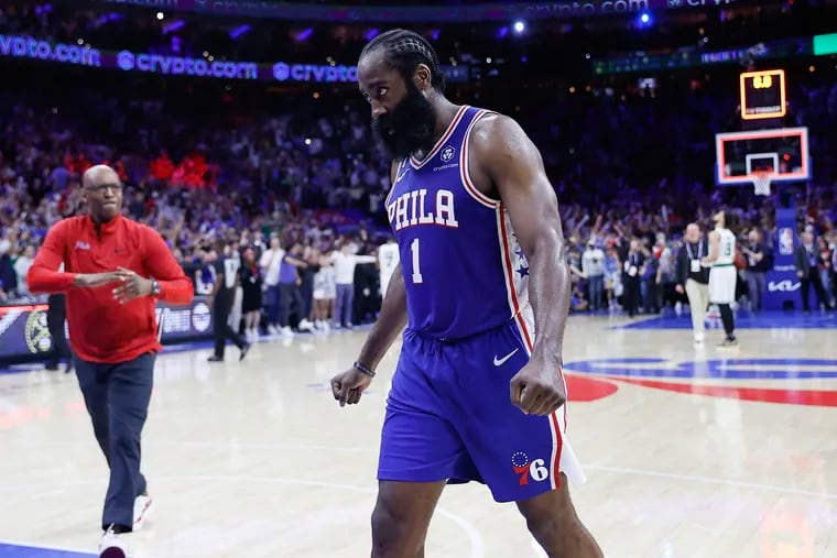Sixers guard James Harden clinches his fist after making the game-winning overtime three-point basket.
