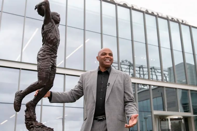 NBA Hall of Famer and former 76er Charles Barkley unveils his new sculpture on the team's Legend Walk outside of the training complex in Camden.