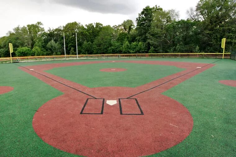 Rubber-surfaced field in Cherry Hill is almost ready and will offer "opportunities for the disabled and abled to play together," said a freeholder. (Elizabeth Robertson / Staff)