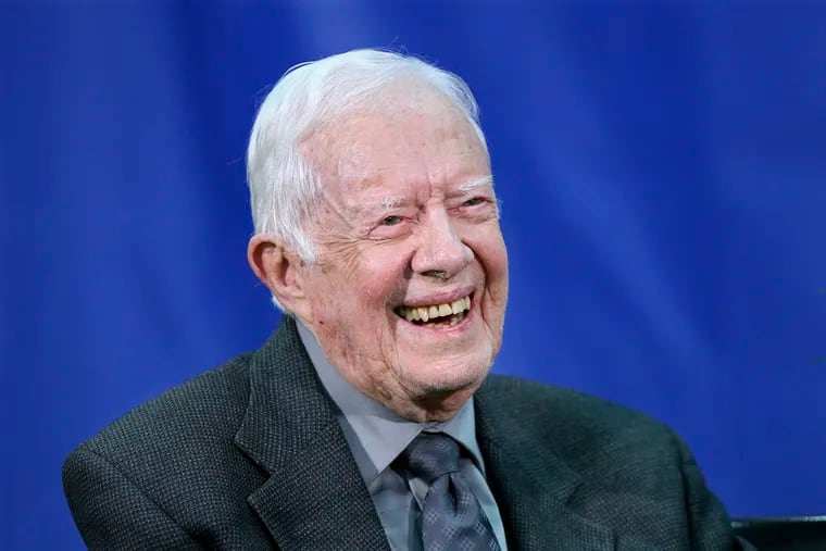 FILE - This Sept. 12, 2018, file photo shows former President Jimmy Carter answering questions from students during his annual town hall with Emory University in Atlanta. (Curtis Compton / Atlanta Journal-Constitution via AP, File)/Atlanta Journal-Constitution via AP)