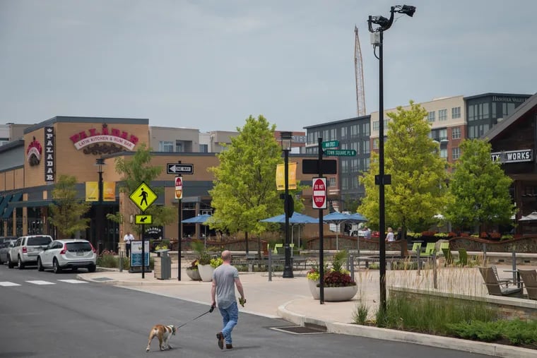 King of Prussia Town Center, situated near I-76 and King of Prussia Mall, July 13th, 2017. The developer-driven town comes complete with an Astroturf town green, parallel parking spaces, and streets named "Village Drive" and "Main Street."