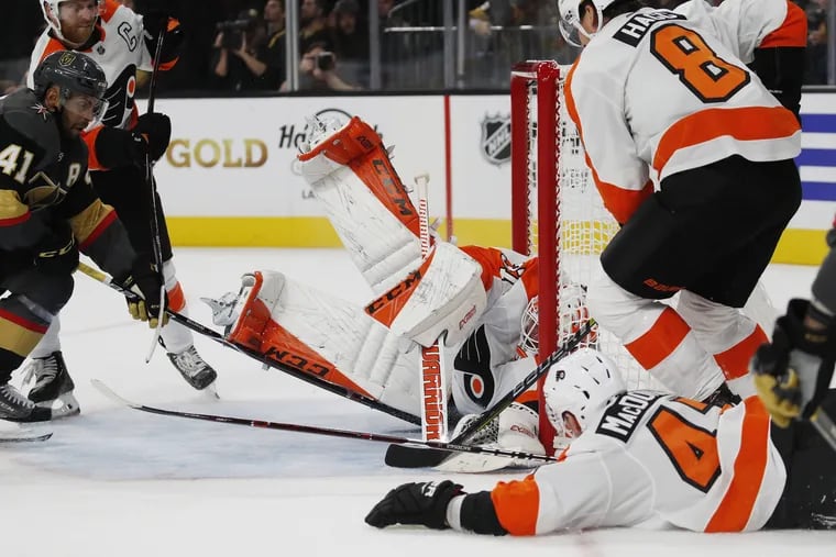 Brian Elliott made some big saves early in the Flyers' opening night win over the Golden Knights in Las Vegas.
