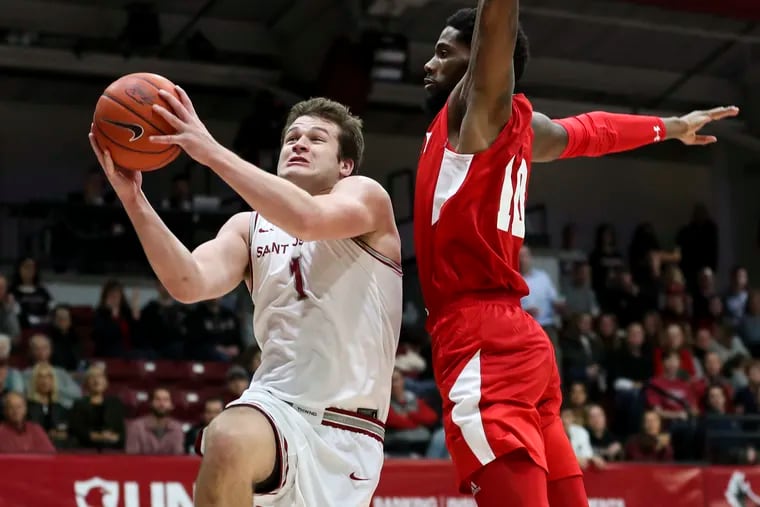 Ryan Daly (1), in action against Bradley, was two points shy of a triple-double despite struggling from the field (2-for-14) on Sunday at Old Dominion. He finished with 13 rebounds and 11 assists in the Hawks' 82-69 loss.