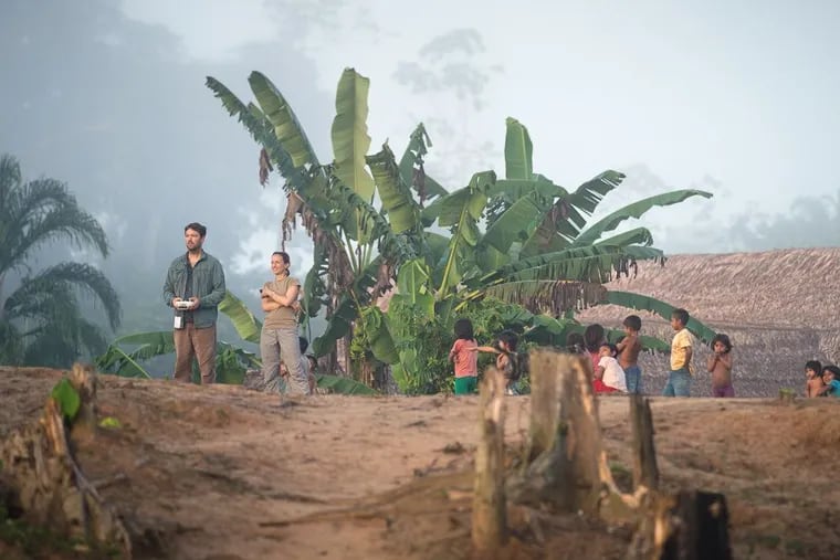 Documentarian  Celine Cousteau (in t-shirt) in Brazil filming Tribes on the Edge.