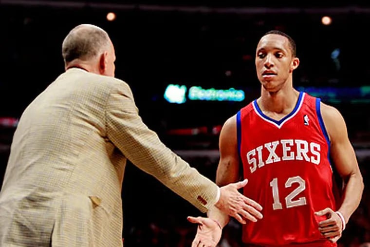 Doug Collins and Evan Turner both have deep ties to the Chicago basketball community. (Ron Cortes/Staff Photographer)