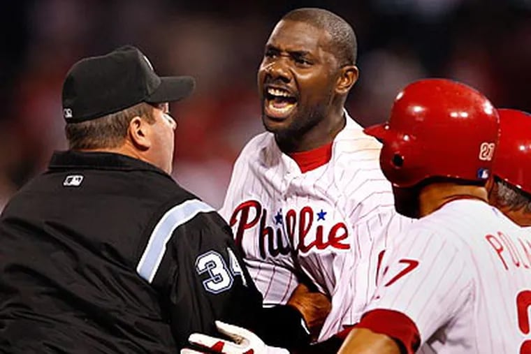 Ryan Howard gave the umpires an earful after being ejected in the 14th inning. (Ron Cortes/Staff Photographer)