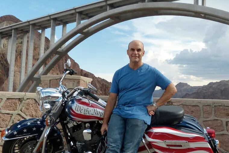 Peter Sagal rides a Harley Davidson in his travels across the country as he hosts &quot;Constitution USA,&quot; a four-part PBS series. CHRISTOPHER BUCHANAN / Insignia Films