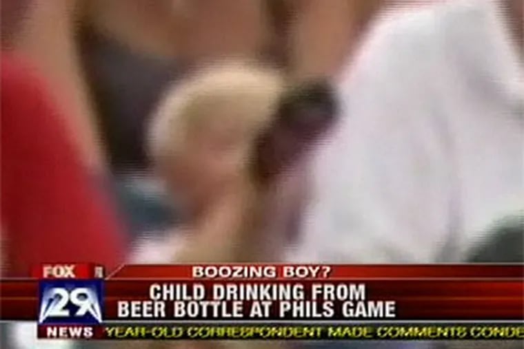 Was this child drinking beer at a Phillies game?  He was seen swigging from the bottle more than once. (Photo courtesy of Fox29)