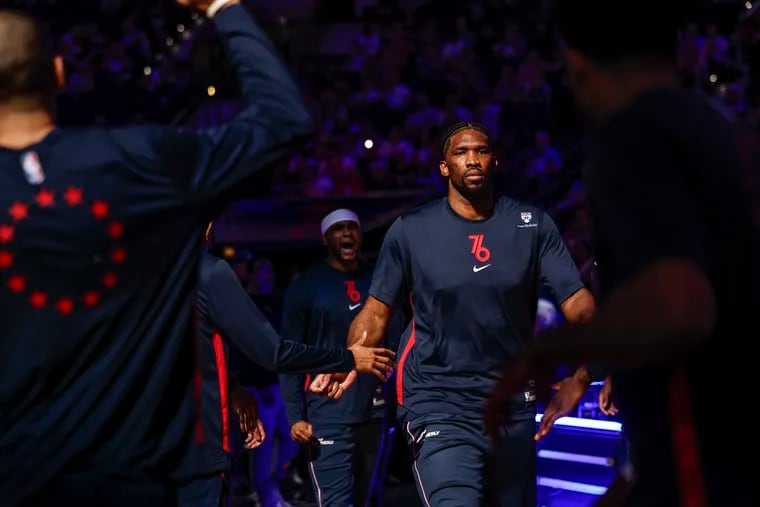 Sixers Joel Embiid is introduced before his game with the Pistons at the Wells Fargo Center in Philadelphia, Tuesday, April 9, 2024.