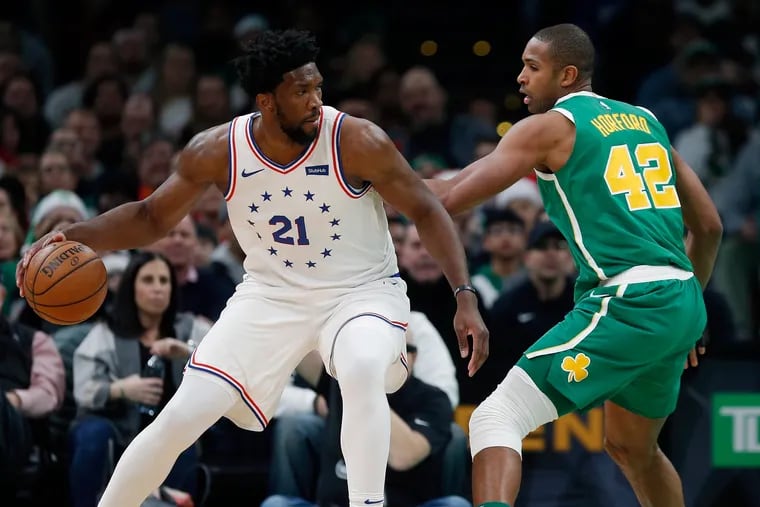 Joel Embiid, new teammate Al Horford (right) and the Sixers will not have to deal with Kawhi Leonard as much after the Toronto superstar bolted for the L.A. Clippers. Leonard's departure opens up the division and the conference.