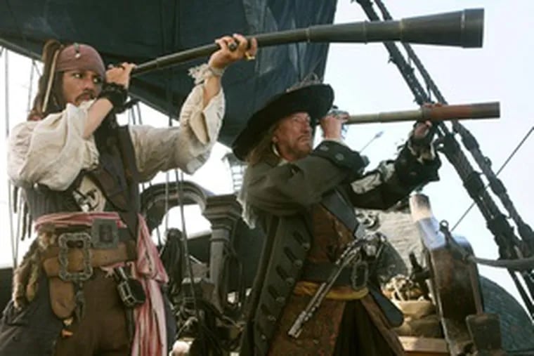 Johnny Depp (left) as Capt. Jack Sparrow and Geoffrey Rush, returning as Capt. Barbossa, swagger and spout their lines with a Shakespearean flourish.