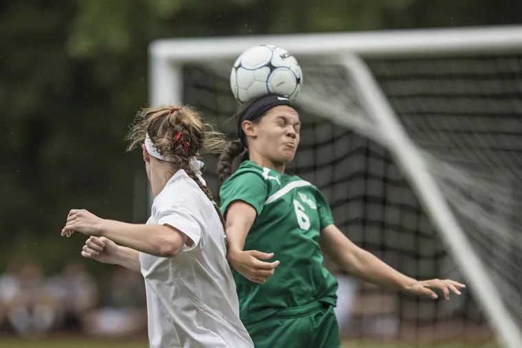 West Deptford’s defender, #6, Jaylee Barquero, right, heads the ball away from Haddonfield striker #9, Madison Bee, left, taking away a scoring oppotunity in the first half of Tuesday game. Haddonfield was ahead 2-0 at the half. West Deptford at Haddonfield girls soccer on September 19, 2017. MICHAEL BRYANT / Staff Photographer