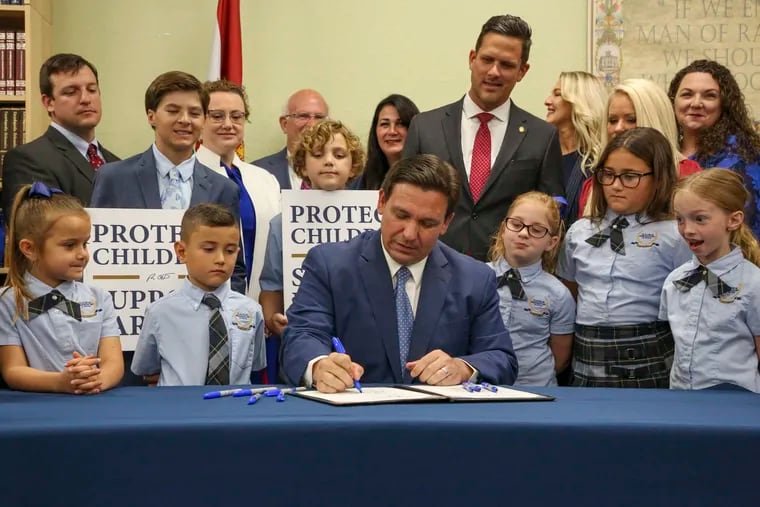 Florida Gov. Ron DeSantis signs the Parental Rights in Education bill at Classical Preparatory School.
