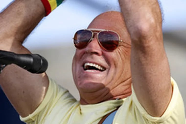 Jimmy Buffett performing in August at the Newport Folk Festival; he&#0039;s cashed in on his image in recent years.