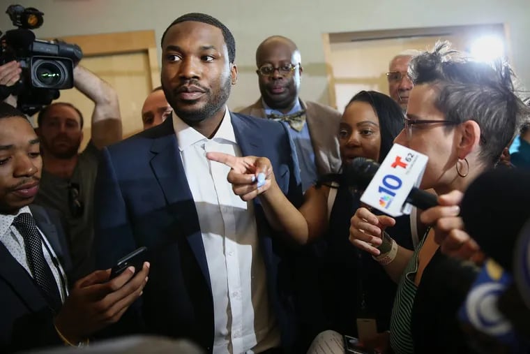 Rapper Meek Mill leaves a news conference promoting Gov. Tom Wolf's proposals to reform the criminal justice system at the National Constitution Center on Thursday, May 3, 2018.