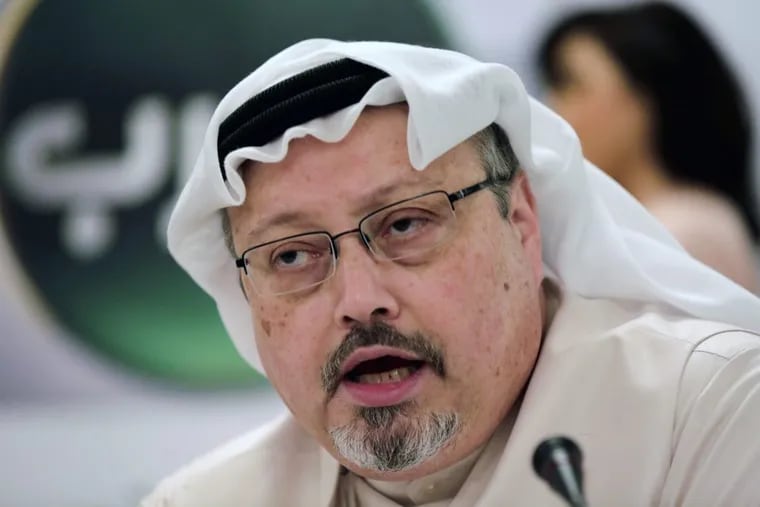 FILE – In this Dec. 15, 2014, file photo, Saudi journalist Jamal Khashoggi speaks during a press conference in Manama, Bahrain.