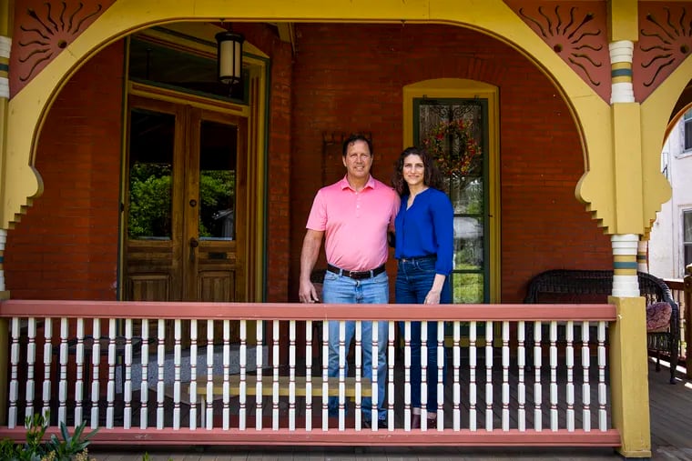 Bob Scavilla and Kim Kalishek were smitten by this 1882 Queen Anne-style home In Mount Airy as soon as they saw. It has taken 14 years to restore it, particularly the woodwork throughout the house.