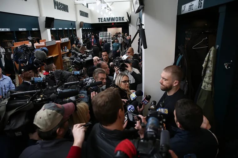 Eagles tight end Zach Ertz talks to reporters as the Eagles players clean out their lockers at the NovaCare practice facility on Monday.