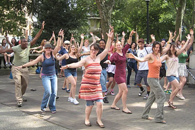 June 25: A flash mob of dancers in Rittenhouse Square. (Jordan Barnett/Staff)