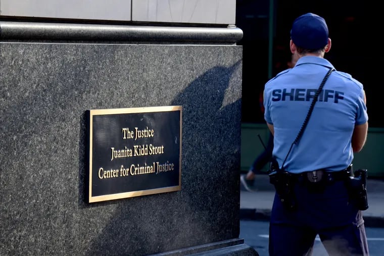 In this file photo, an officer with the Sheriff's Department stands outside the Justice Juanita Kidd Stout Center for Criminal Justice.