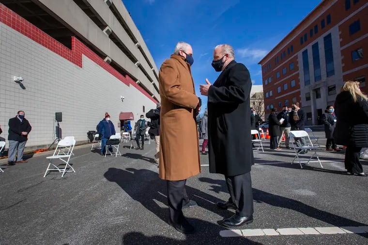 New Jersey Governor Phil Murphy (left) chatting with State Senate President Stephen M. Sweeney, a fellow Democrat, before a Wednesday event to announce redevelopment of the Walter Rand Transportation Center in downtown Camden, kicking off the project to redevelop the transportation hub.