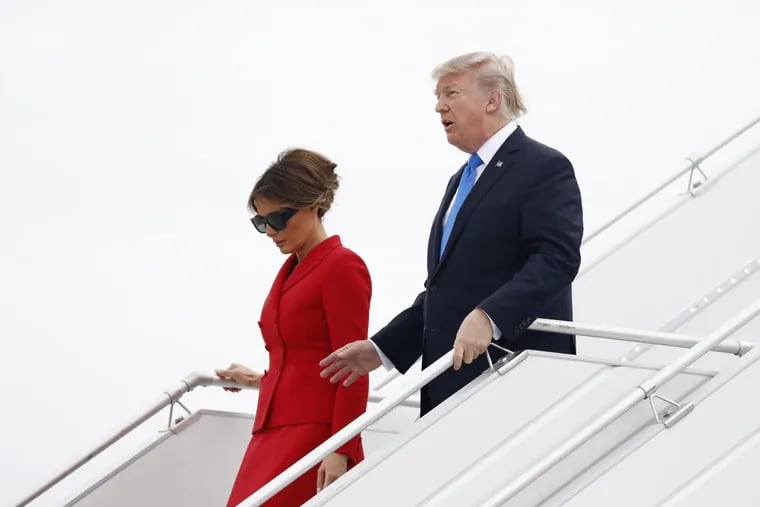 President Trump and first lady Melania Trump arrive on Air Force One at Orly Airport in Paris on Thursday.
