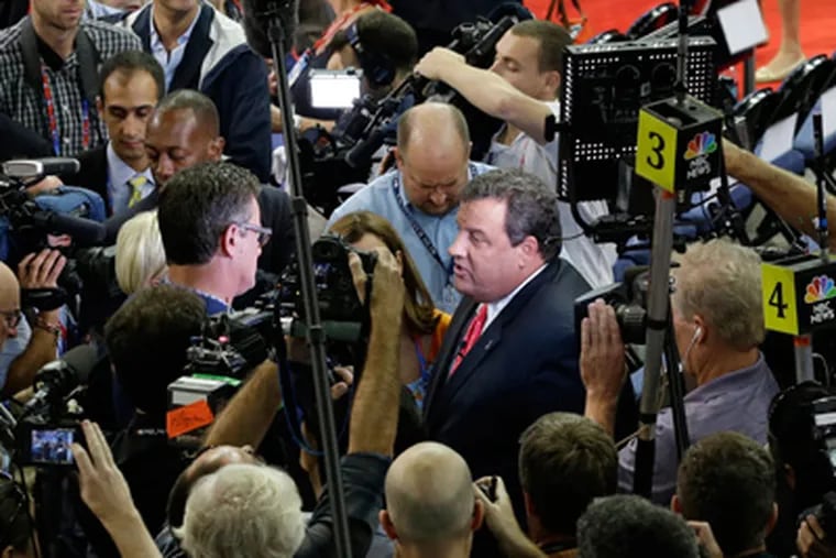 New Jersey Governor Chris Christie walks through the convention floor before the start of the Republican National Convention in Tampa, Fla., on Monday, Aug. 27, 2012. (AP Photo/J. Scott Applewhite)