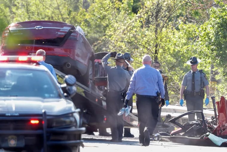 Law enforcement at the scene of a car crash in Boothwyn where three people died after Pennsylvania State Police chased the driver in connection with an alleged retail theft.