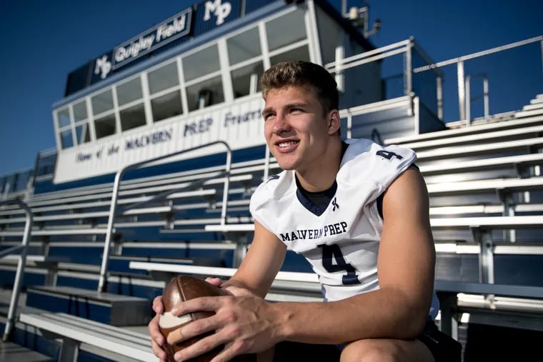 Football player Keith Maguire, shown here in the bleachers, on the Malvern Prep football field, in Malvern, PA, Thursday, May 24, 2018. JESSICA GRIFFIN / Staff Photographer