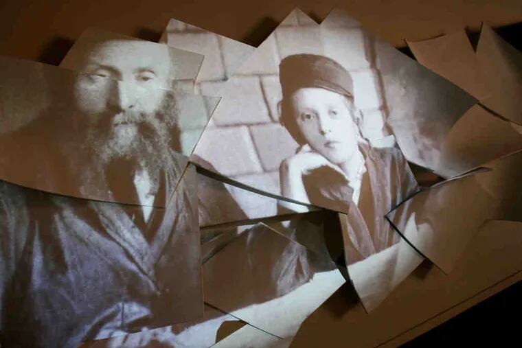 Images of Jewish immigrants are projected onto a sculpture in the third-floor “Dreams of Freedom” exhibit, dealing with the period from 1880 to 1945, at the National Museum of American Jewish History. In every corner of the museum, history lessons document what it has been like to be a Jew in America.