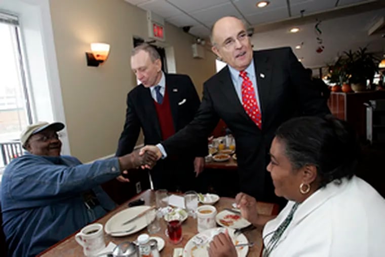 Campaigning for John McCain , former New York City Mayor Rudy Giuliani (right) and Sen. Arlen Specter(R., Pa.) greet Alfonso Maxwell and Carol Smith at the Penrose Diner in South Philadelphia.