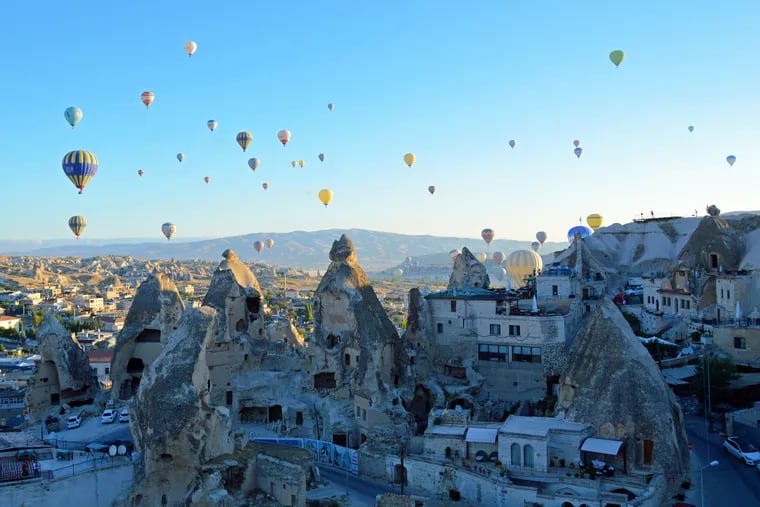 In the Cappadocia region of central Turkey, between 100 and 150 hot air balloons take flight every day if the weather is right.