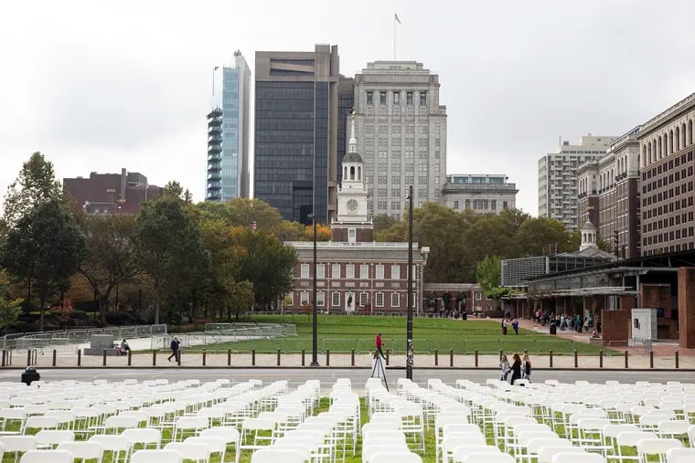 The national nonprofit organization COVID Survivors for Change set up 860 empty chairs in front of Independence Hall on Friday. Each chair symbolizes 10 people who've died from COVID-19 in Pennsylvania.