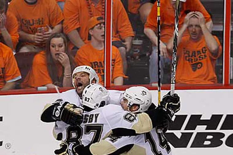 Fyers fans are stunned after Syndey's Crosby goal in the second period. (Ron Cortes / Staff Photographer )