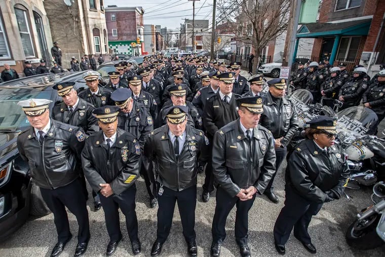 A large Philadelphia Police presence filled the 1700 block of Oxford Street on Thursday, Jan. 30, 2020, for a ceremony to honor Officer Frederick Cione, who was fatally shot while patrolling the block 50 years ago. Acting Police Commissioner Christine M. Coulter; Managing Director Brian Abernathy; and the officer's brother, Nicholas Cione Sr., spoke during the ceremony.